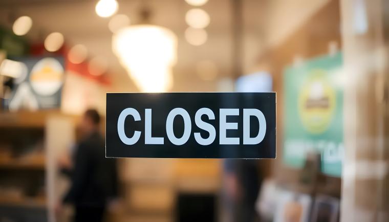 a closed sign on a business