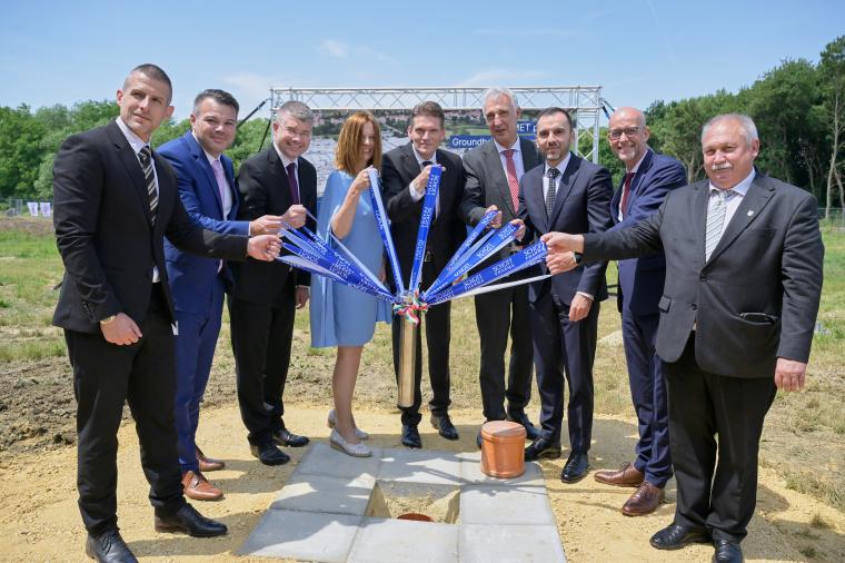 Representatives posing for a symbolic start of construction.