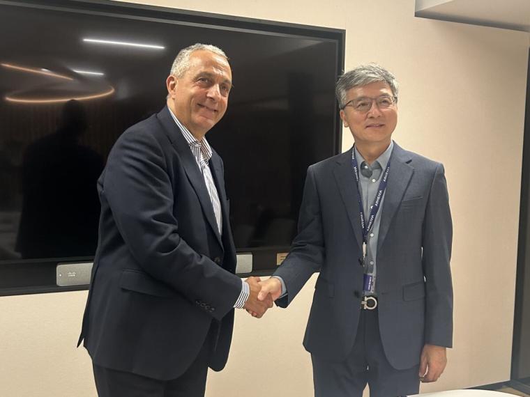 representatives at the partnership signing