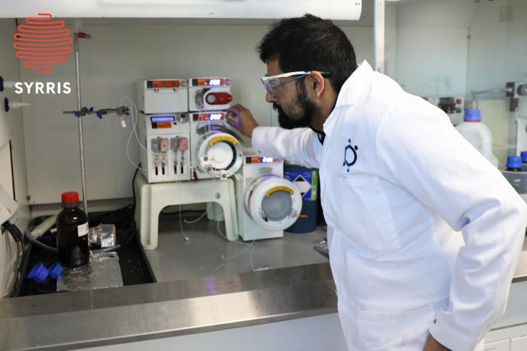 Scientist using the Syrris Asia Flow Chemistry System